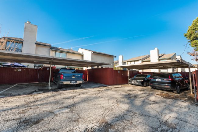 View of parking with a carport | Image 19