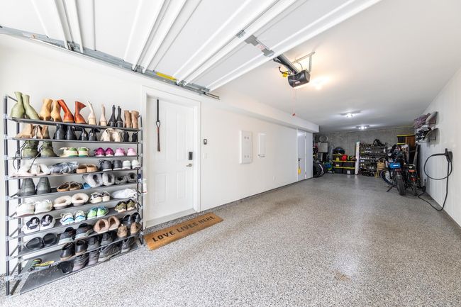Garage featuring a garage door opener | Image 25