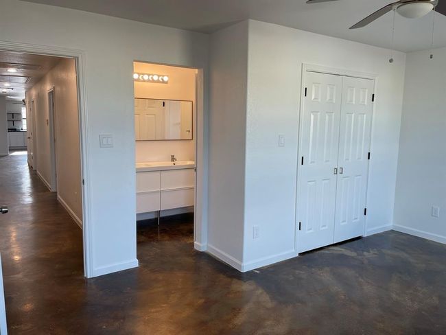 Primary Bedroom w/ en-suite bathroom separate vanity and toilet room. | Image 8