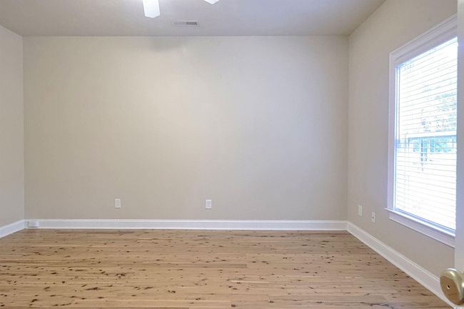 Spare room with light wood-style flooring and baseboards | Image 15