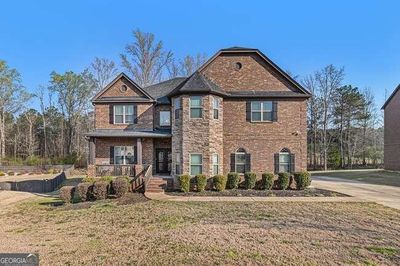 2214 Golden Eagle Drive, House other with 5 bedrooms, 4 bathrooms and 2 parking in Locust Grove GA | Image 1