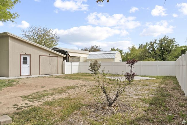 View of yard featuring a guest house | Image 26