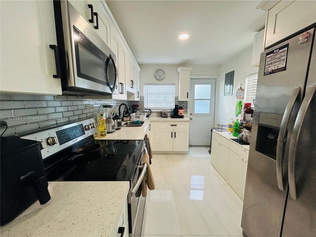 2376 Nw 55 Th St, House other with 4 bedrooms, 2 bathrooms and null parking in Miami FL | Image 5