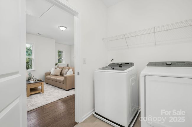 Large laundry room with plenty of space for ironing or folding | Image 20