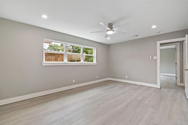 2nd view of Primary bedroom. Nice windows for more natural lighting. | Image 8