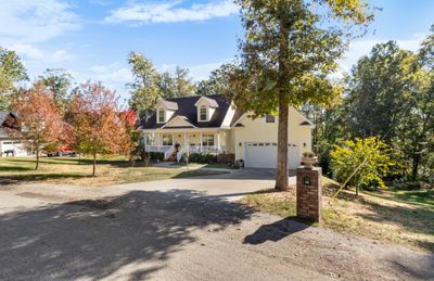 This home sits on 1.38 acres, with beautiful views of the water from the back yard. | Image 3