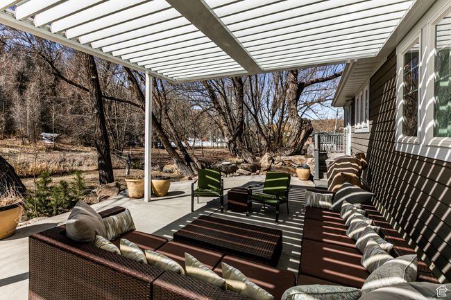View of patio / terrace with a pergola and an outdoor living space | Image 34