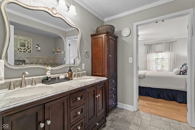 full bathroom with double vanity | Image 21