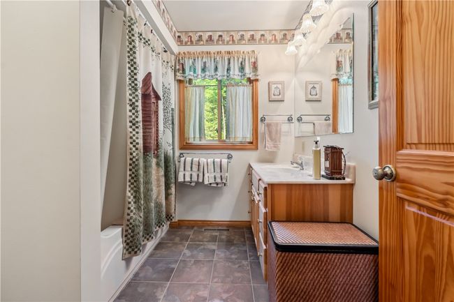 Main Level bathroom with tub/shower | Image 24