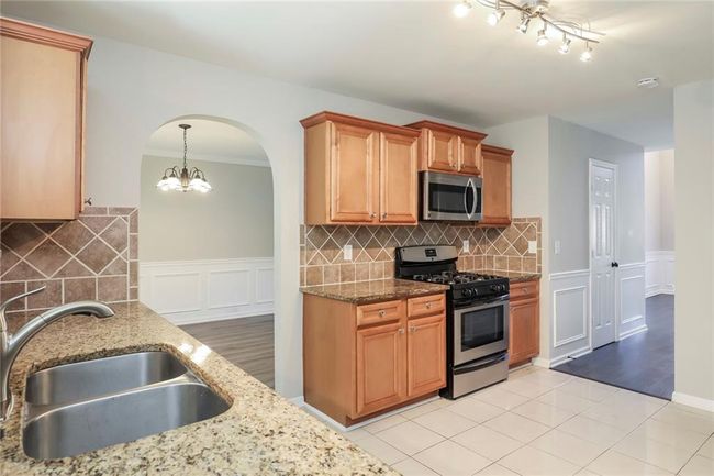 7677 Bowhead Ct, House other with 4 bedrooms, 3 bathrooms and null parking in Fairburn GA | Image 4