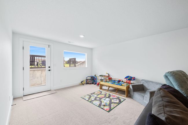 Rec room with carpet floors, baseboards, and recessed lighting | Image 27