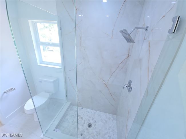 Full bath with a marble finish shower and toilet | Image 23