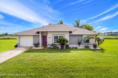 213 Eaglesmere Drive, House other with 3 bedrooms, 2 bathrooms and null parking in Lehigh Acres FL | Image 1