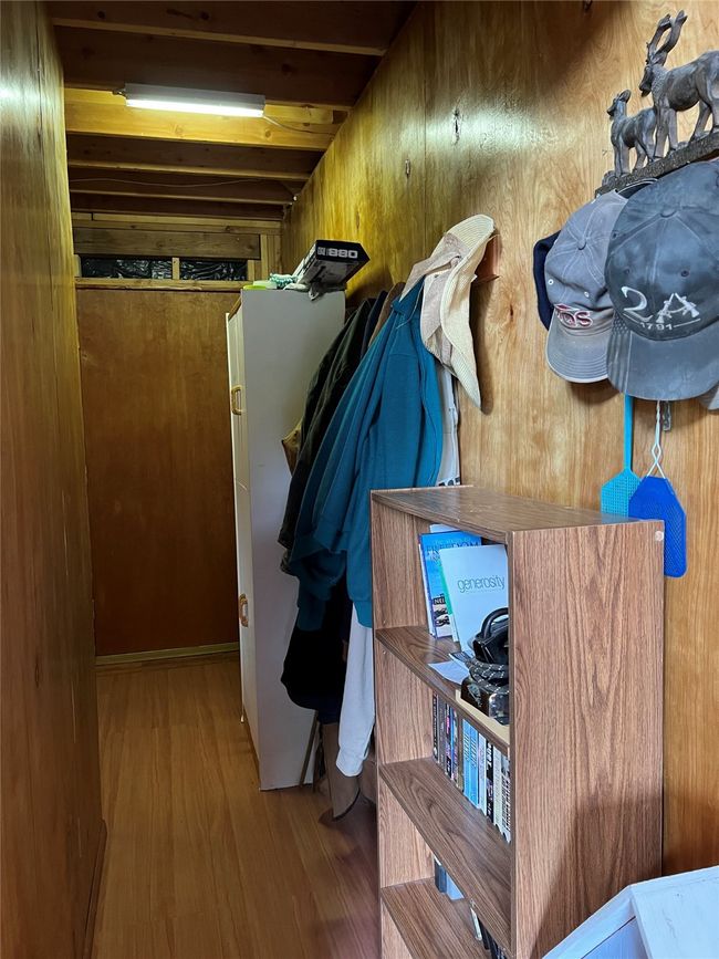 hallway to bathroom viewed from living room area | Image 57