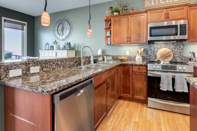 569 Boulder Creek Circle Se, House other with 4 bedrooms, 3 bathrooms and 6 parking in Langdon AB | Image 13
