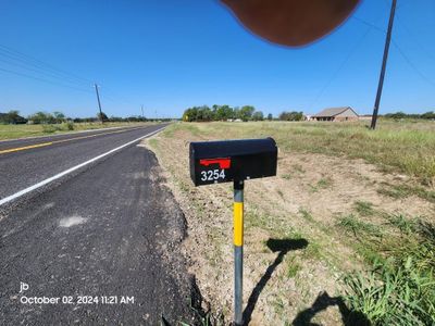 View of street with a rural view | Image 2