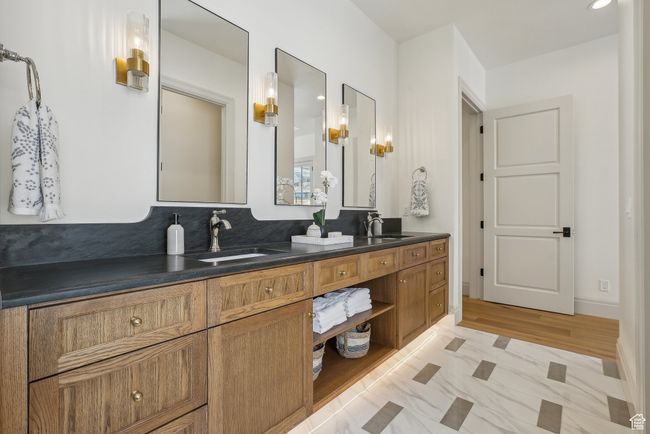 Full bath featuring double vanity and a sink | Image 28