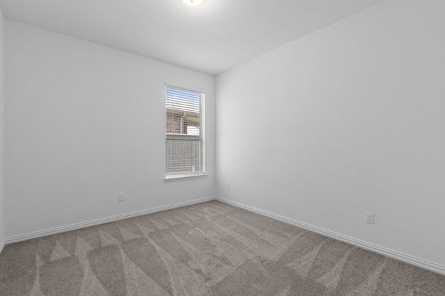 Carpeted spare room with baseboards | Image 15
