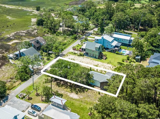 Aerial overview of property's location with property parcel outlined | Image 22