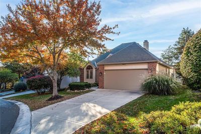 View of front of property with a front lawn and a garage | Image 3