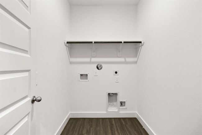 This bright utility room makes even the most mundane chores feel a little more pleasant. | Image 21