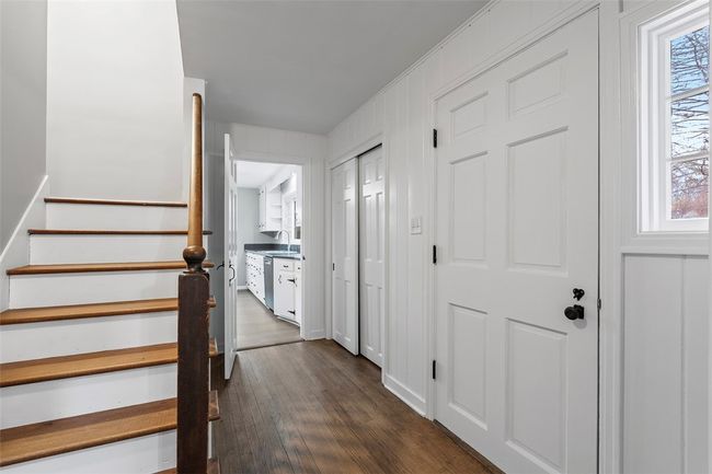 New flooring and fresh paint greet you upon entering the home. | Image 5