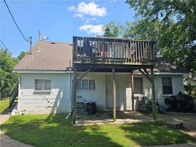 Back of property with a yard and a deck | Image 2