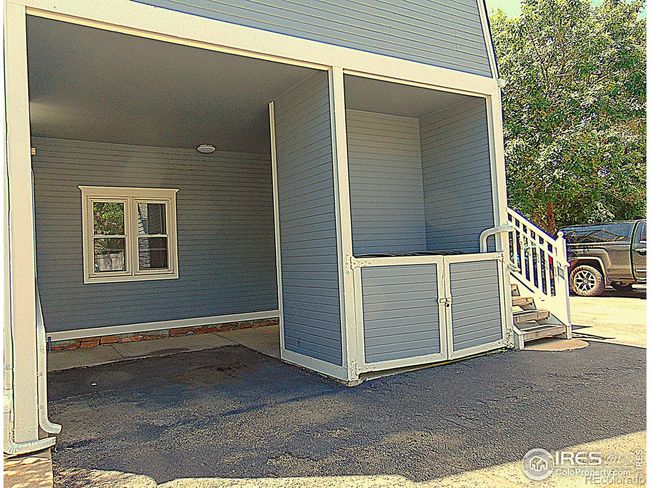 Covered parking space by bedroom window | Image 15