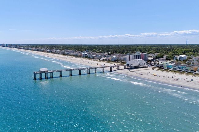 Bird's eye view featuring a water view and a beach view | Image 34