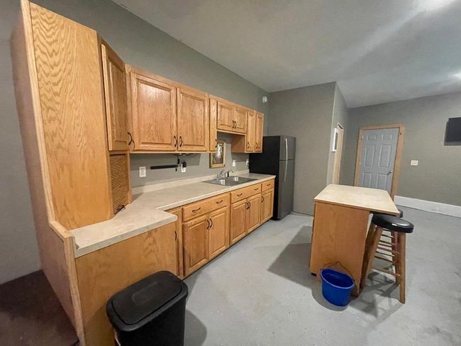 Kitchen area in attached garage. | Image 22