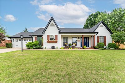 Welcome home to this gem of a three bedroom, two bath corner lot home. | Image 1