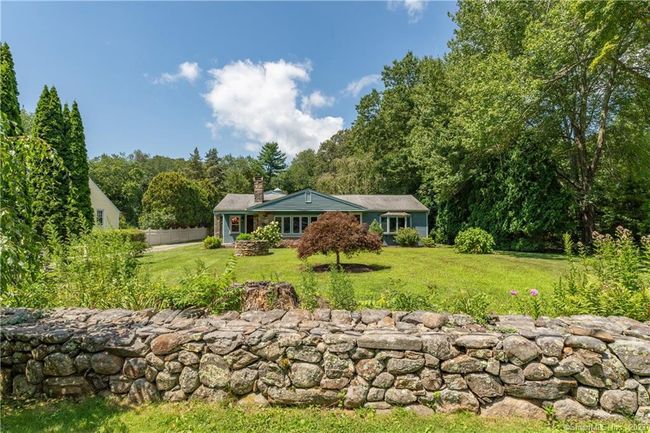 Just two miles to the historic Guilford Green shopping, restaurants, and transportation are just minutes away. If you are looking for one-floor living in a beautiful home - Look no Further! | Image 34