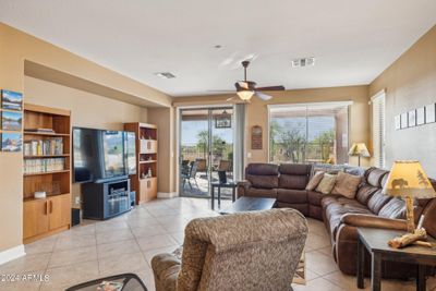 Family room with exit to backyard | Image 3