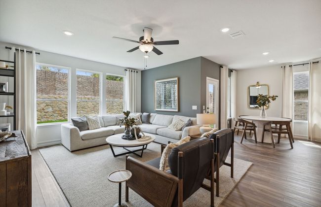 Open concept gathering room creating a spacious and inviting atmosphere *Model representation | Image 9