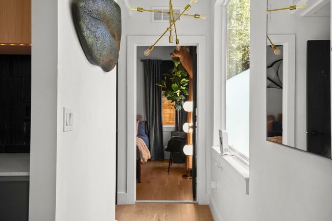 Corridor featuring light wood-style floors | Image 15