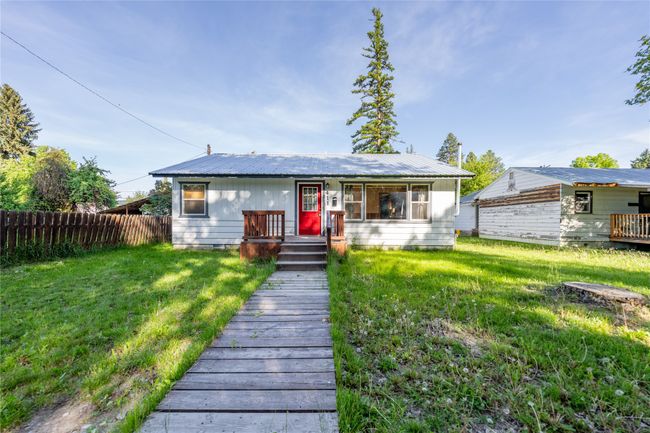 View of front facade featuring metal roof | Image 24