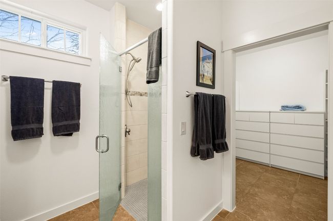 Full bath with a stall shower and tile patterned flooring | Image 18