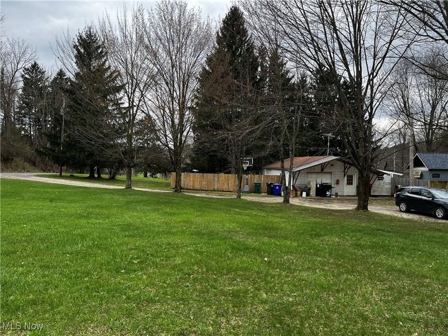 View of yard featuring fence | Image 4