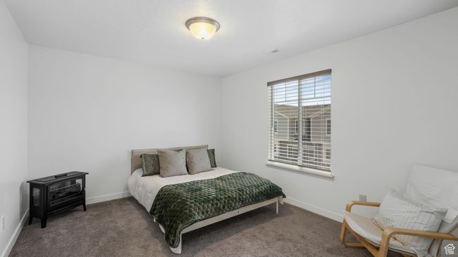 Bedroom featuring carpet floors | Image 19
