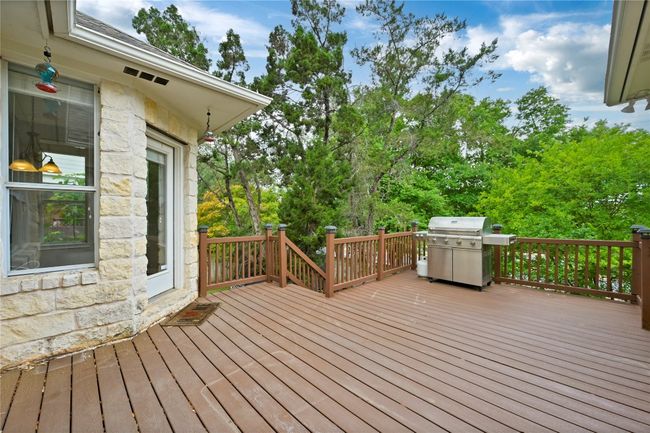 Wooden deck with a grill | Image 21
