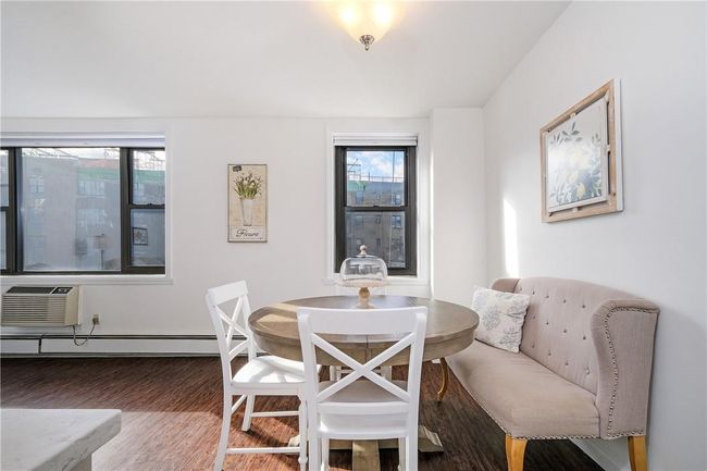 View of dining area toward windows. | Image 14