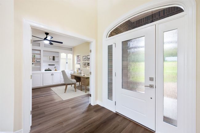 Spacious office with built-ins and double door for privacy. Virtually staged. | Image 18