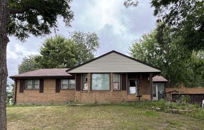 View of front facade featuring a front lawn | Image 1