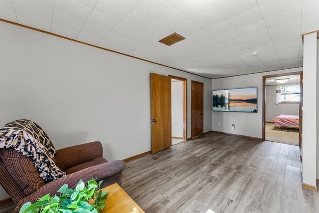 A convenient under-stair closet provides extra storage. | Image 14