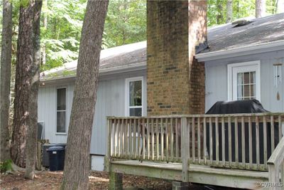 Rear view of house featuring a deck | Image 3