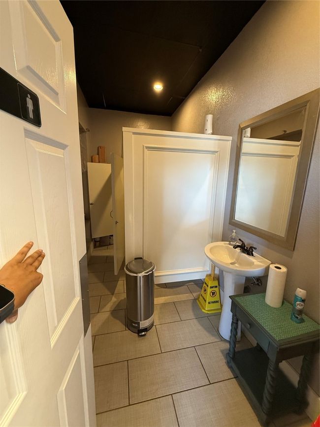 Bathroom with tile patterned floors | Image 9
