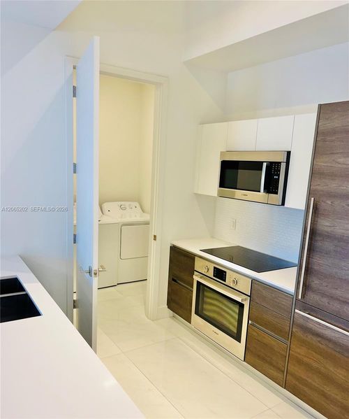 210-301 Altara Ave, Coral Gables, FL, 33146-1457 | Card Image
