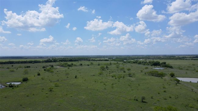 Birds eye view of property featuring a rural view and a water view | Image 5