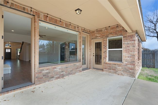 View of patio / terrace with fence | Image 39
