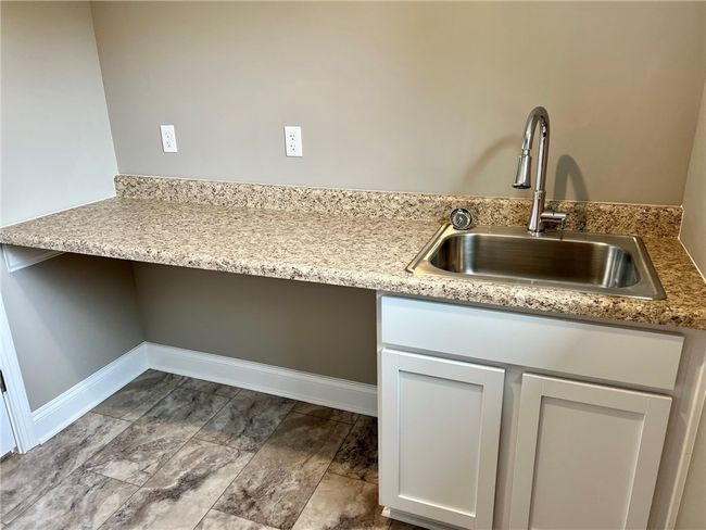 2nd floor laundry with sink and counter top | Image 24